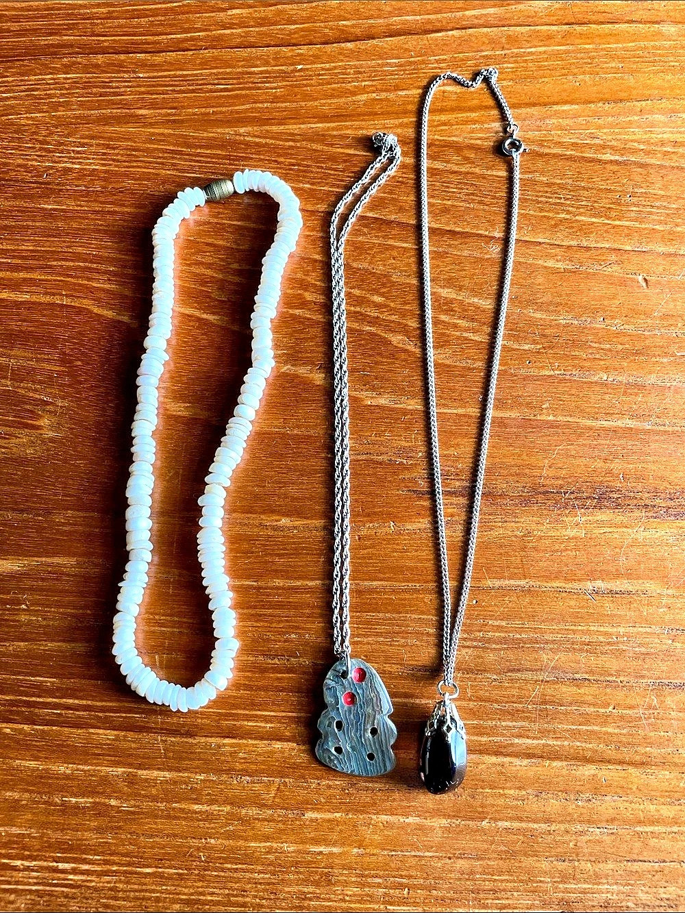 Three stone necklaces